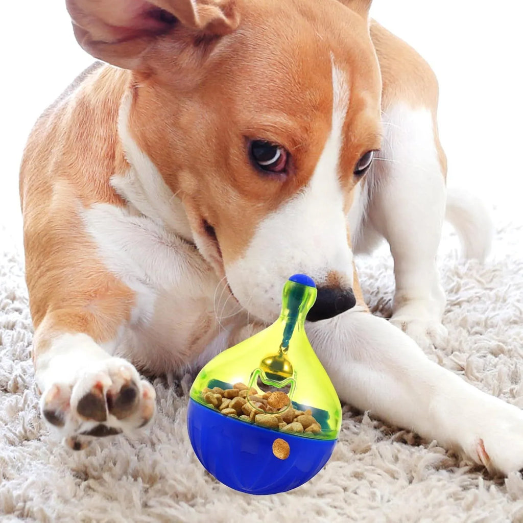 Tumbler-shaped pet treat dispenser toy for dogs and cats with leaky food openings