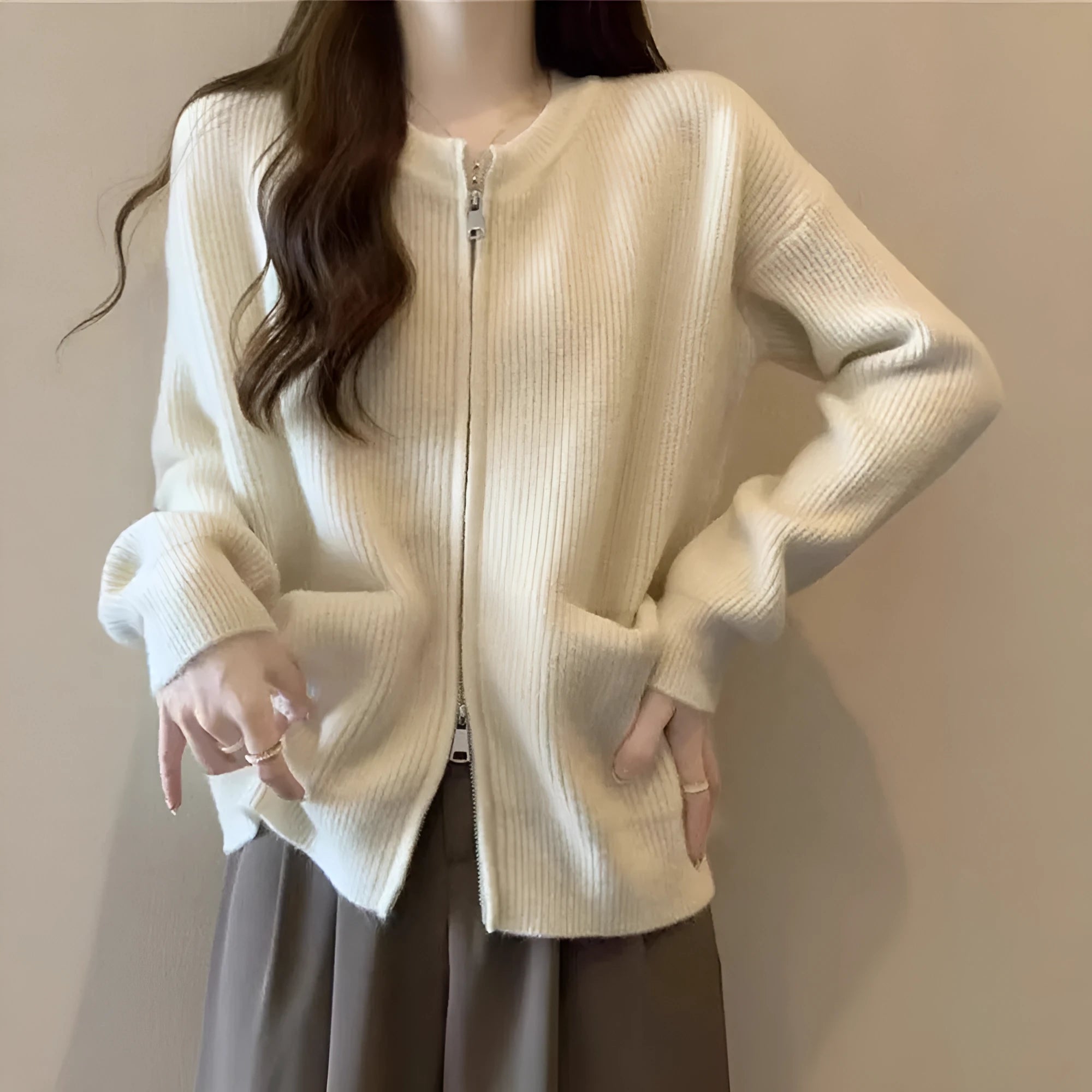 Beige viscose knit sweater coat for women, shown as an open-front cardigan with long sleeves.