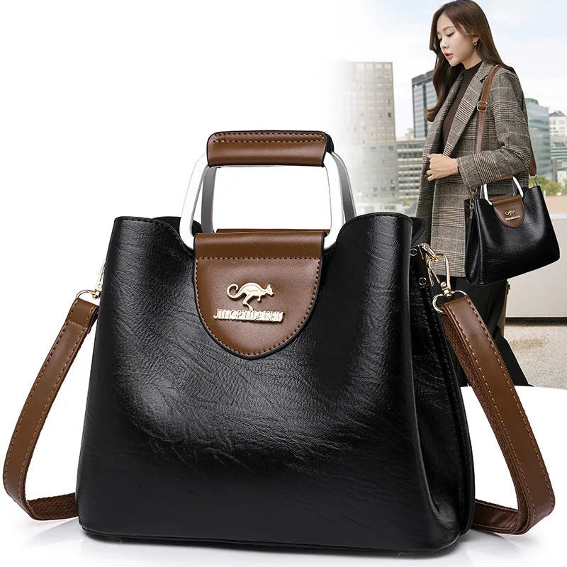 Large capacity PU leather tote bag in black, crossbody style, horizontal square shape with sewing line details