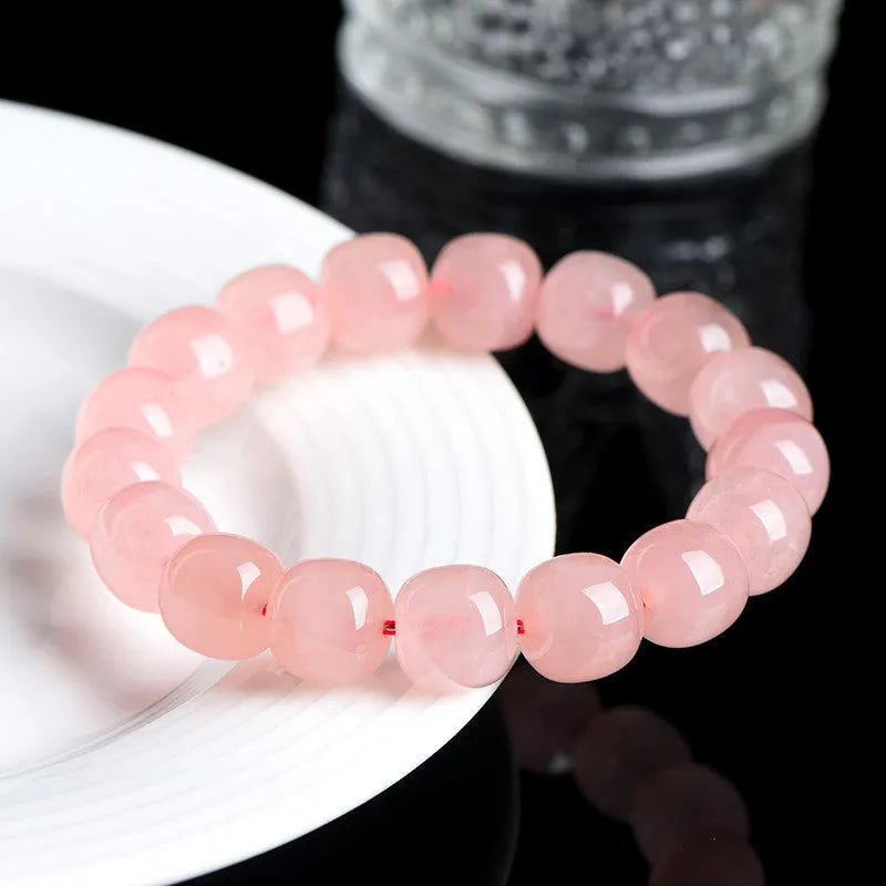 Pink barrel-shaped crystal bead bracelet with geometric 8-10mm beads