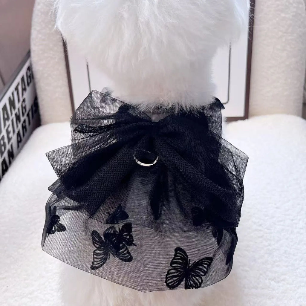Black gauze princess tulle skirt for a dog or cat on a size chart.