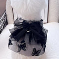 Black tulle princess skirt for a small dog or cat on a mannequin, showing layered gauze.