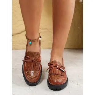 Women's brown loafers with decorative bow on artificial PU upper, shown in UK size 39