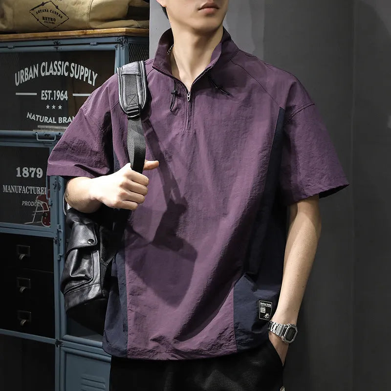 Brown men's half-zip stand collar short-sleeve shirt on a hanger, showing loose fit and ice silk fabric texture.