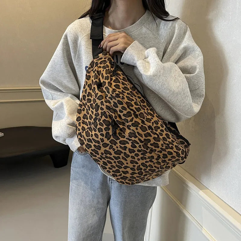 Retro canvas chest bag with leopard print and patchwork design, soft construction, available in multiple colours