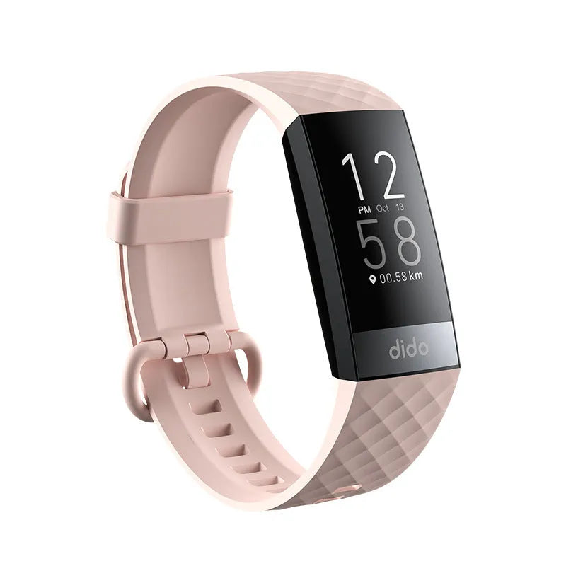 Black smart bracelet on wrist showing blood pressure and heart rate data on its 1.1-inch screen.