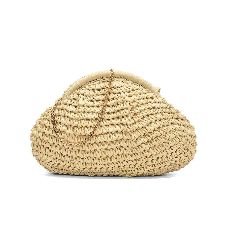Women's beige shell-shaped paper straw bag with a metal chain strap.