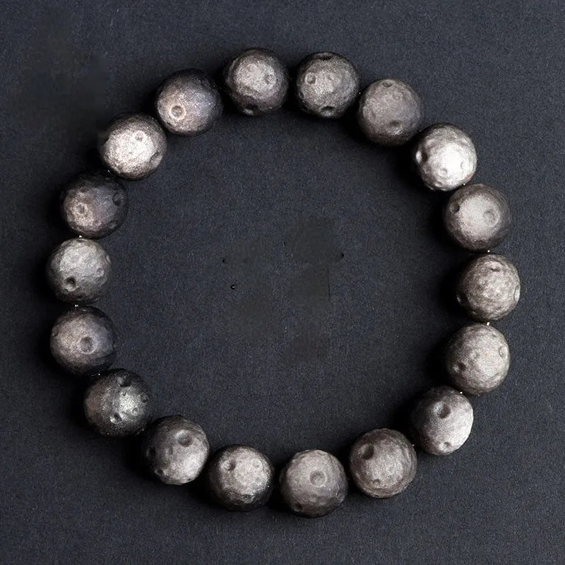 Natural obsidian meteorite crater ball bracelet with polished volcanic glass beads in silver or gold colours