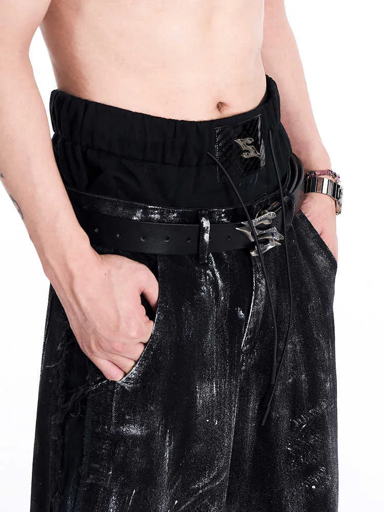 Black leather belt with metal letter buckle showing 110cm length