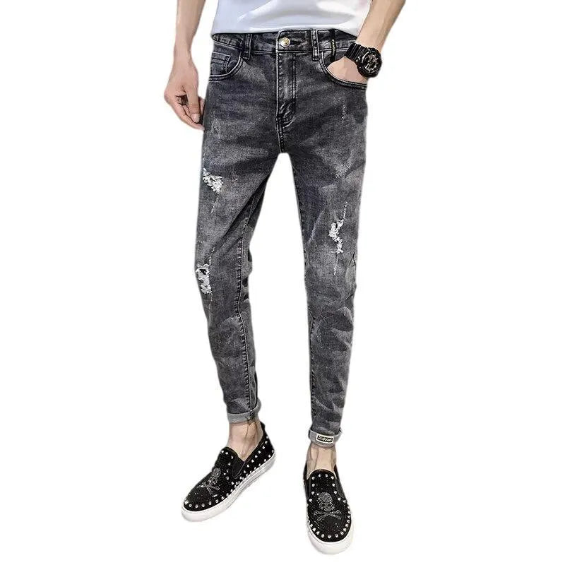 Men's high-waist blue denim jeans with button fly and standard trouser length on mannequin