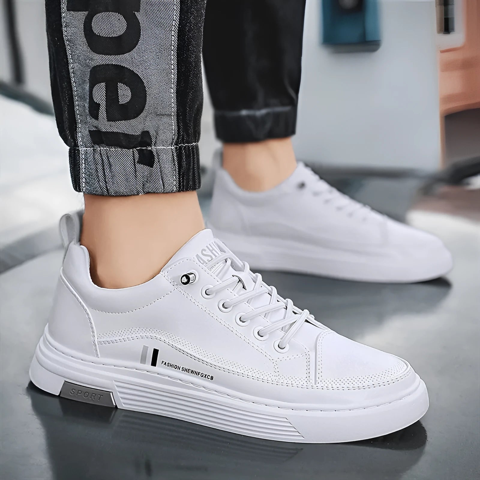 Men's white low-top skate shoes with elastic band closure and rubber sole.
