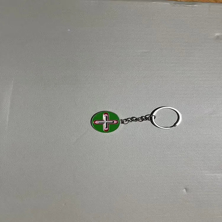 Colourful pendant keychain made of zinc alloy in eight colour options including black, blue, green, pink, purple, red, sky blue, yellow.