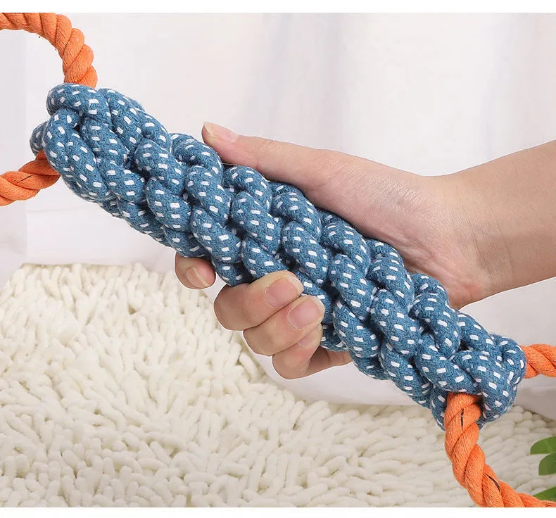 Blue braided cotton bone rope dog toy with double rings for interactive play