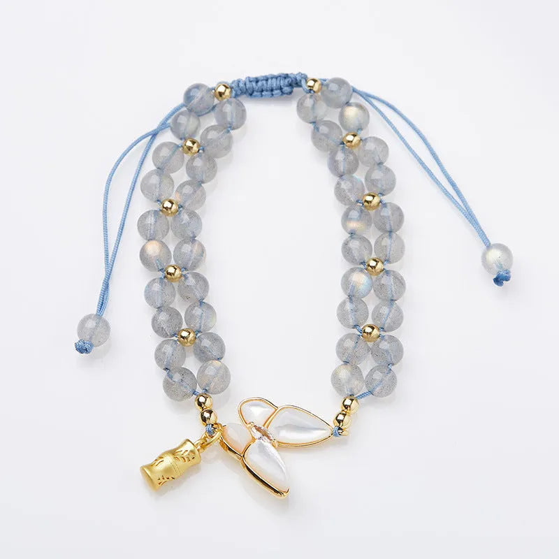 Grey moonstone butterfly charm woven bracelet for women with geometric retro design