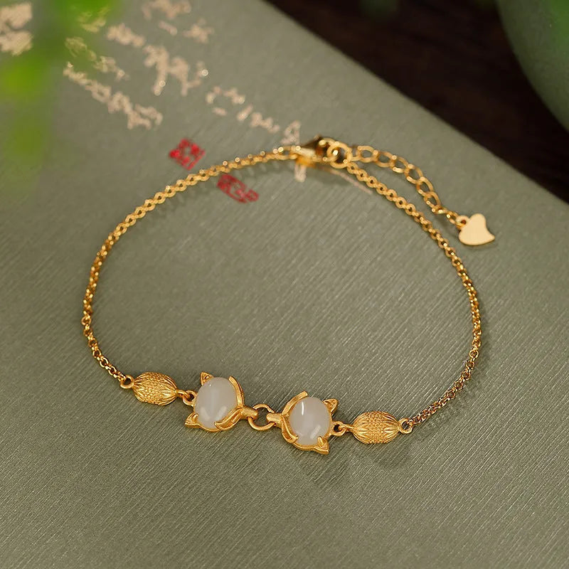 Women's silver bracelet with fox charm pendant in jade or jasper colour options