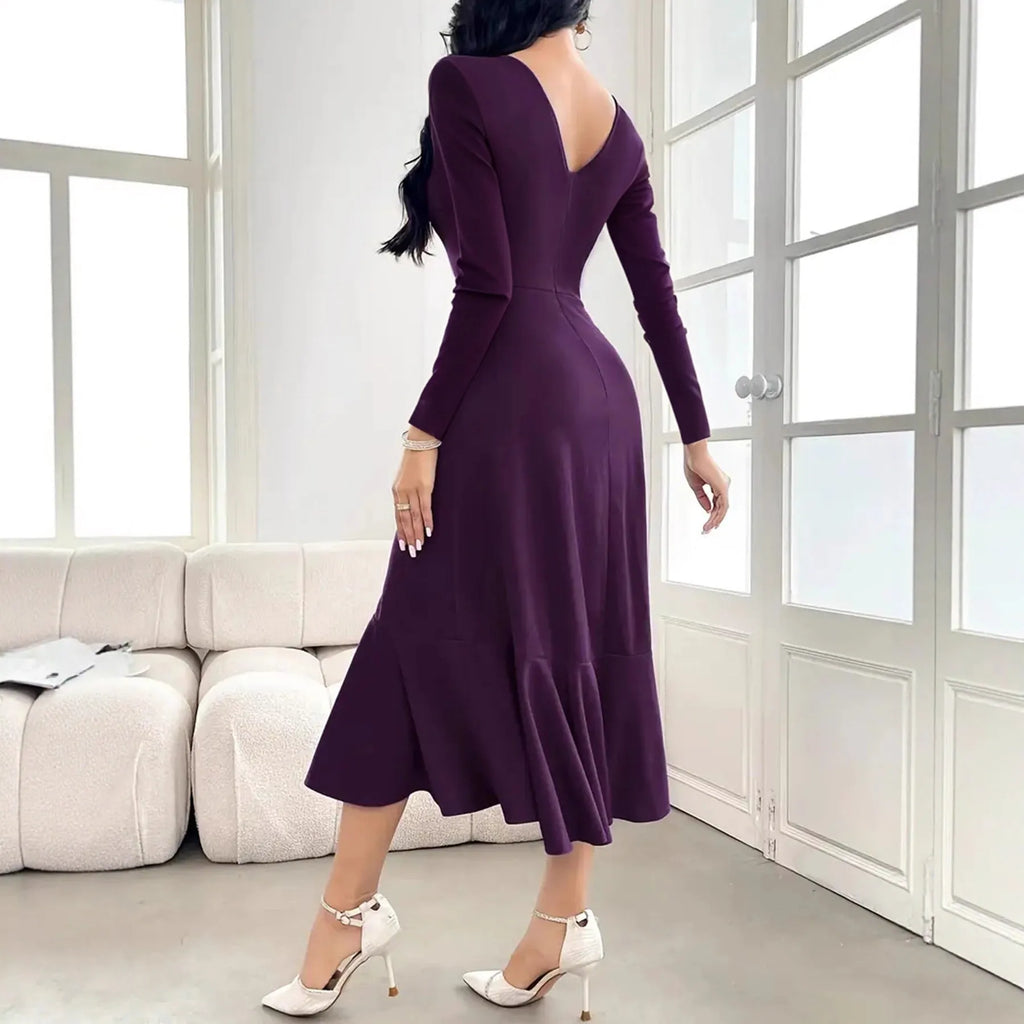 Purple women's long sleeve dress with ruffled detail and a mid waist.