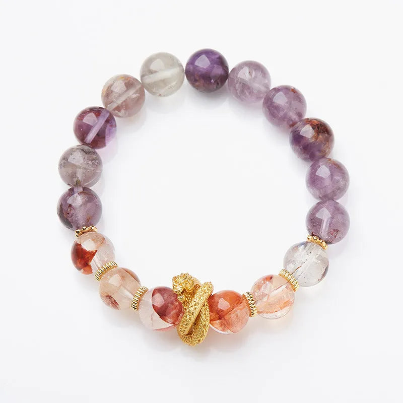 Purple crystal bracelet with animal zodiac beads and nine purple good luck elements
