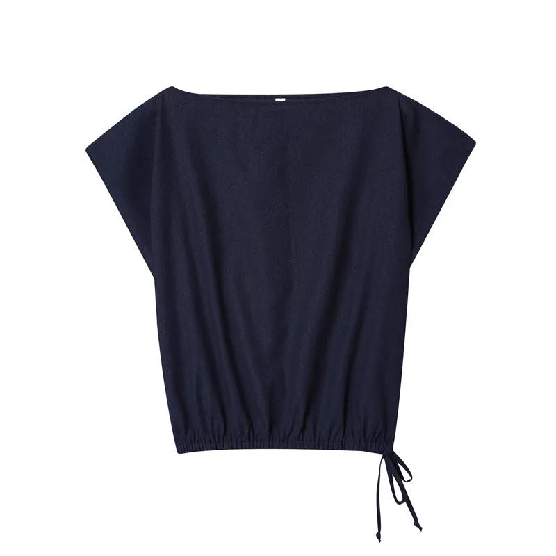 Women's linen blend co-ord set featuring a blouse with flounced sleeves and matching wide leg trousers.