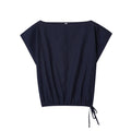 Women's linen blend co-ord set featuring a blouse with flounced sleeves and matching wide leg trousers.