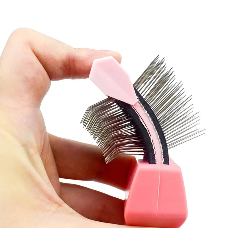 Blue double-sided pet brush with stainless steel pins on a white background