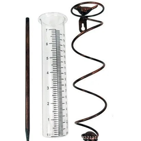 Cast iron bird rain gauge with glass measurement tube showing 0-800ml capacity and 1-20 scale