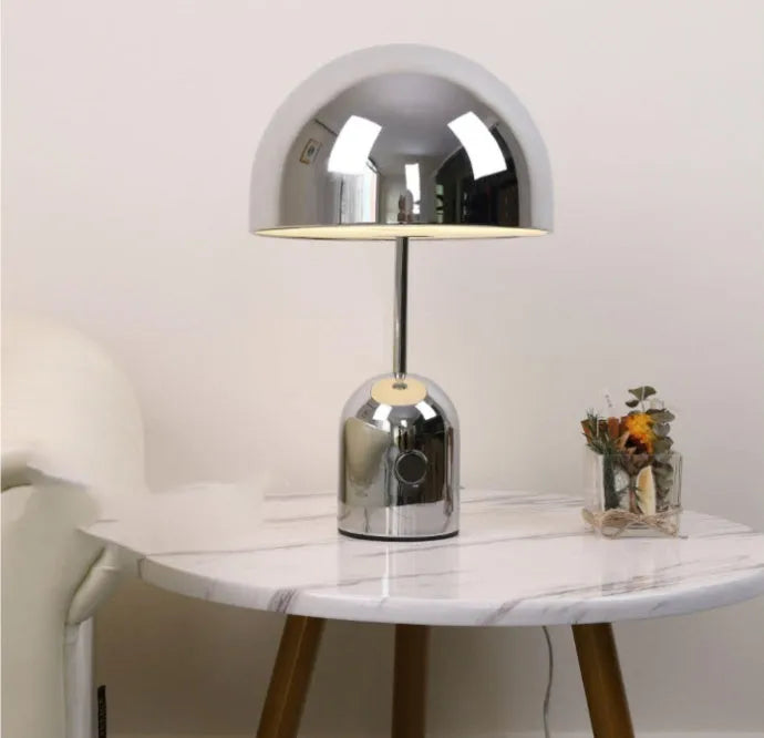 Mushroom table lamp with metal base in rose gold finish measuring 280mm wide