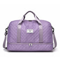 Large black Oxford cloth travel bag with a breathable lining, showing 36-55 litre capacity.