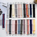 Woven nylon Apple Watch replacement strap in multiple colours including Rainbow and reflective options