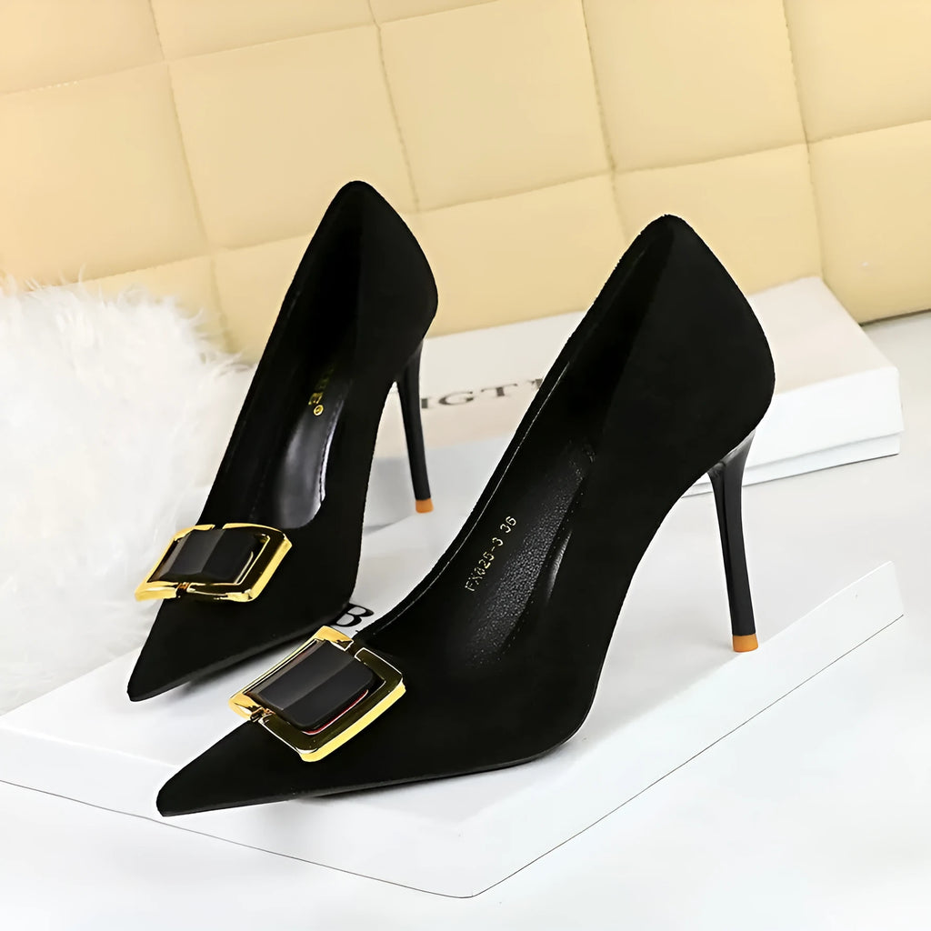 Black suede women's stiletto high heels with a 9cm heel and pointed toe on a rubber sole.