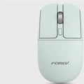 Wireless Bluetooth mouse with wireless charging in grey colour on desk