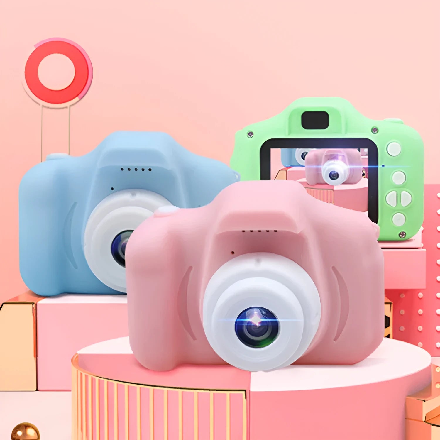 X2 HD mini cartoon kids digital camera in silicone body with 2-inch screen and lanyard.