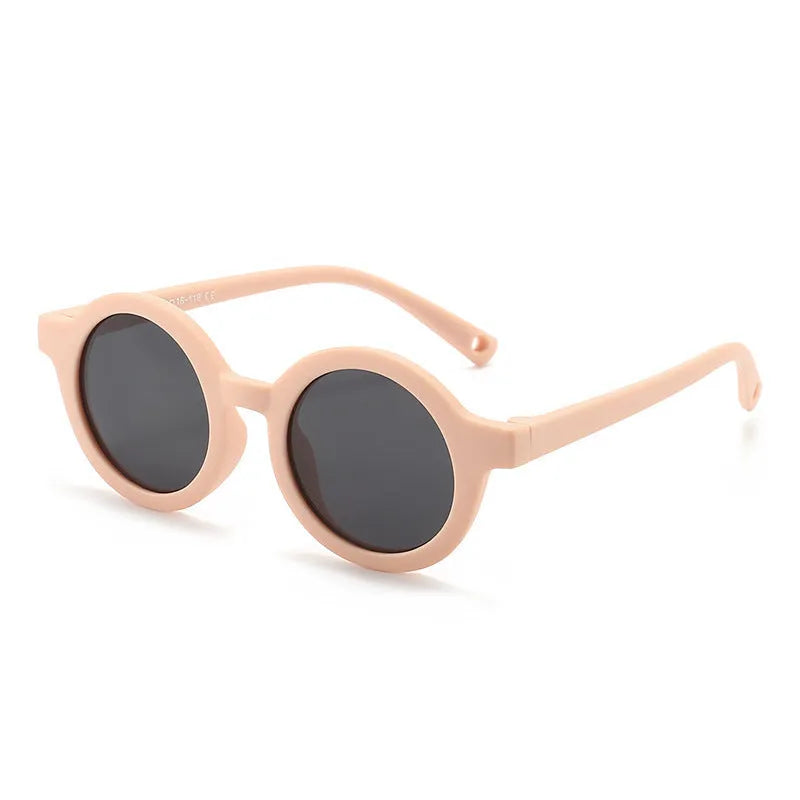 Children's silicone sunglasses with round full frame, UV400 polarised TAC lenses, and flexible TPEE construction for 0-3 year olds