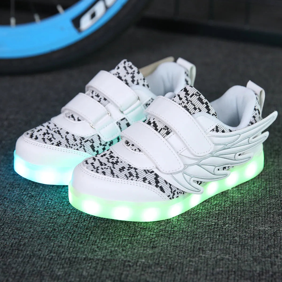 Children's plum red and white LED light-up sneakers with USB charging port and colourful luminous soles