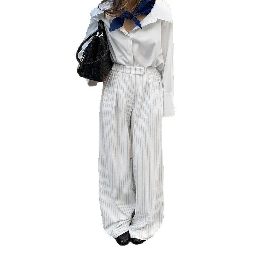 White striped wide-leg women's trousers with front zipper fastening for commuting