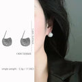Geometric drop-shaped earrings with golden beans and full diamond decoration in gold colour