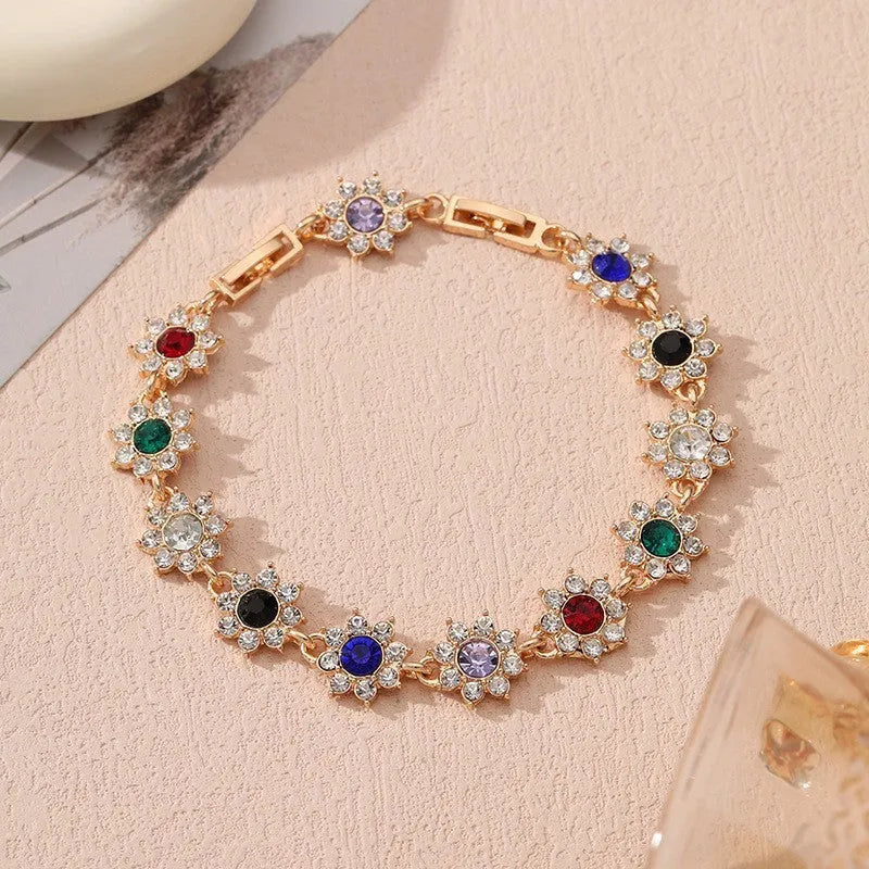 Flower-shaped zinc alloy bracelet with electroplated finish and colourful crystal accents