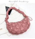 Women's nylon underarm shoulder bag in beige colour showing front view with adjustable strap