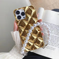 iPhone case with attached chain bracelet and rhinestone charm in plated rhombus pattern