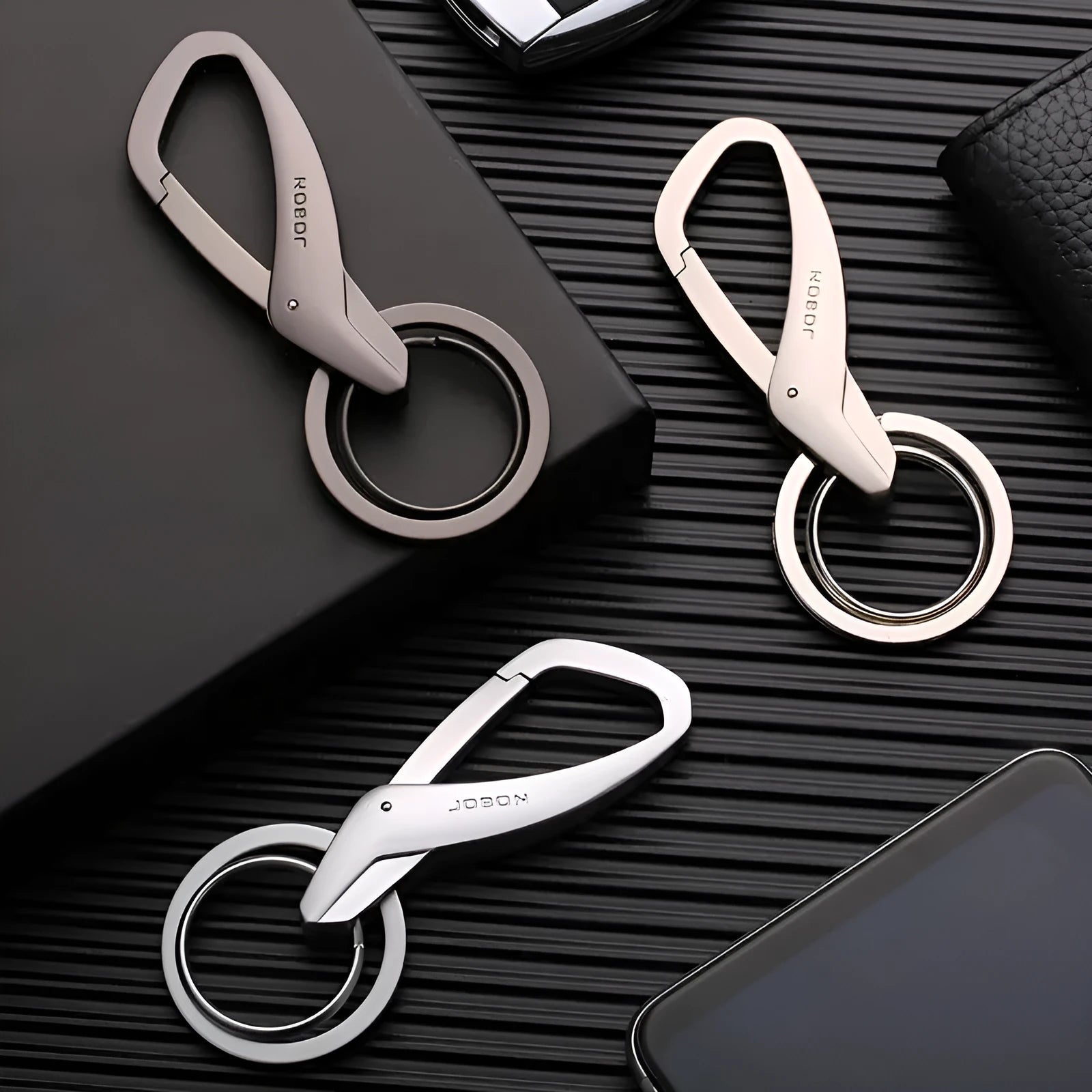 Zinc alloy double ring key chain for car keys in black, chrome, or nickel finishes.