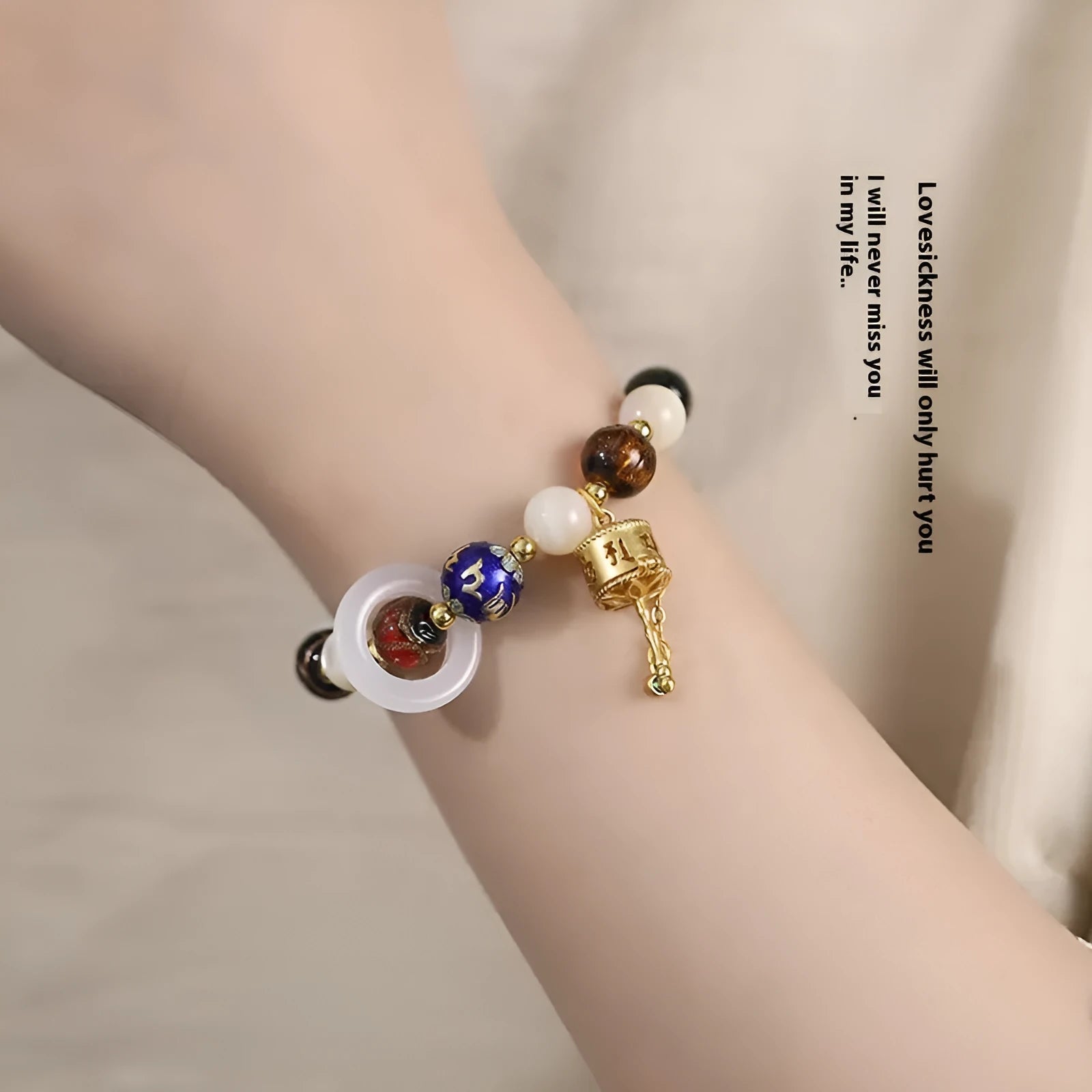 Women's hand-woven bracelet with fragrant grey coloured glaze and natural stone beads