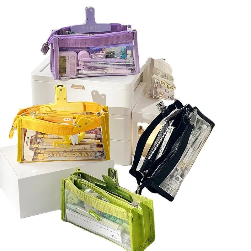Transparent non-woven fabric school pen bag showing it can hold many coloured pens