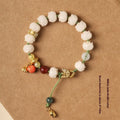 White jade Bodhi bracelet with hand-woven lotus and pumpkin beads on open rope design