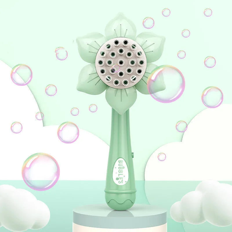 Sunflower shape plastic electric bubble blower toy in mint green colour on table