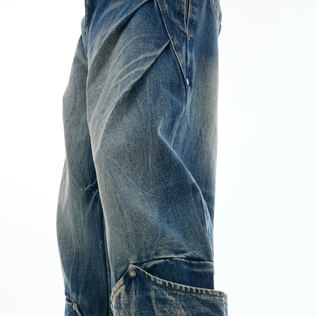 Men's verdant blue loose-fit jeans with a retro washed finish and curved knife style.