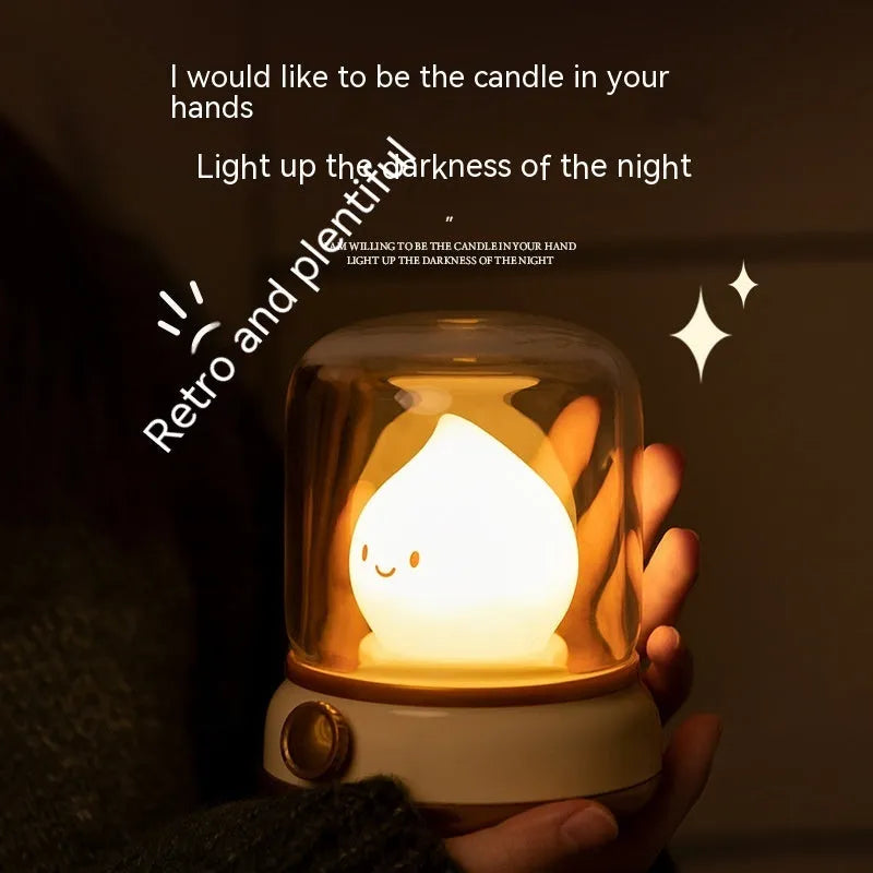 Retro oil lamp style USB rechargeable LED table lamp with dimmable lighting on wooden table