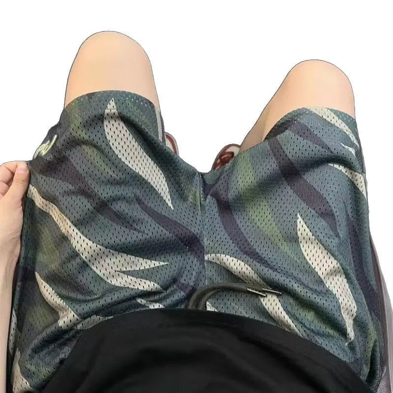 Men's camouflage mesh shorts in cotton blend fabric with straight cut design