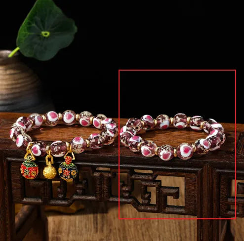 Handmade fluorescent glaze bracelet with swallowing gold beast motif on heart-shaped 10mm beads