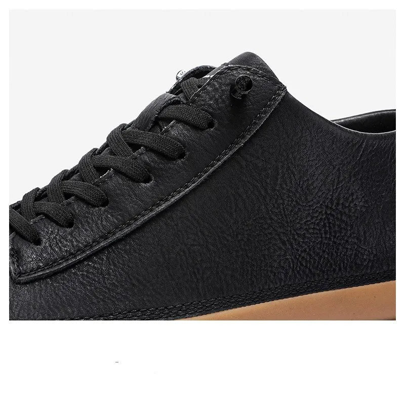 Men's black casual leather shoes with round toe and rubber soles displayed alongside white colour option