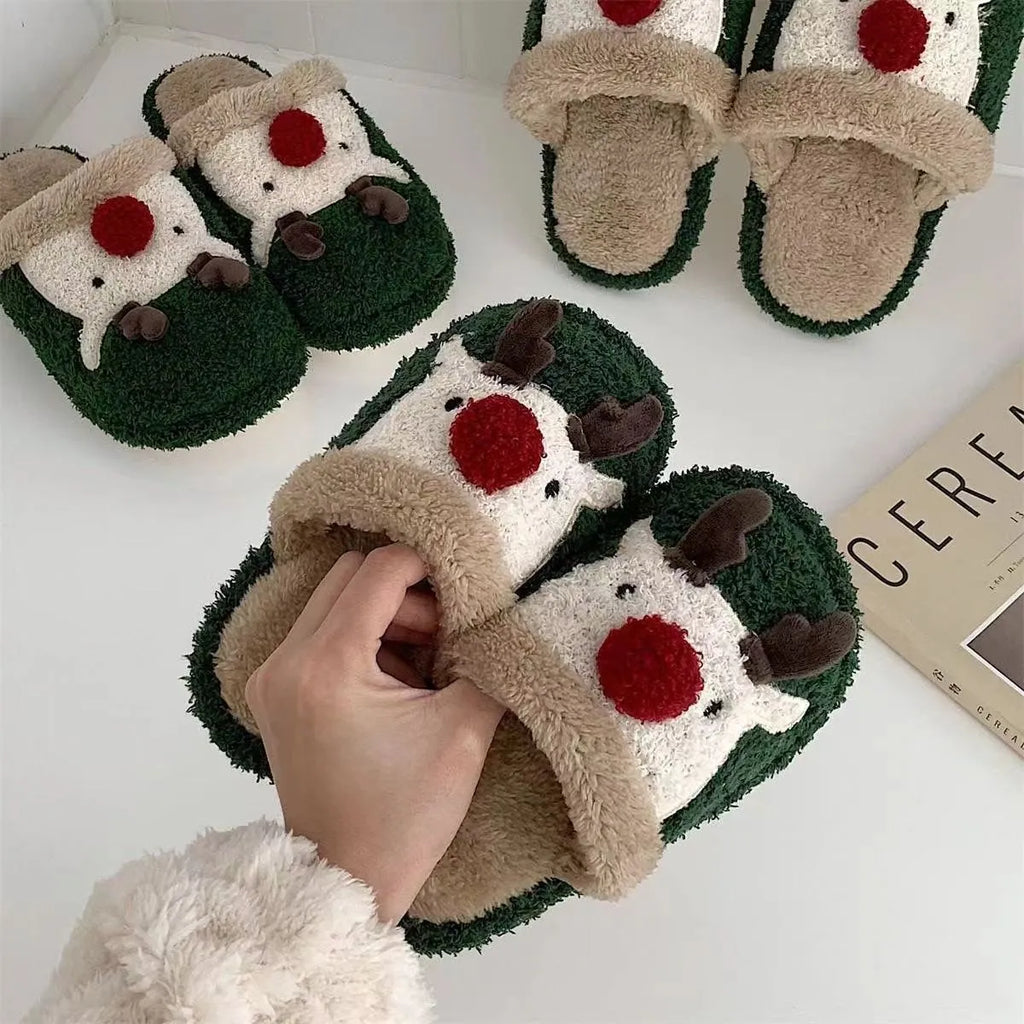 Women's brown Christmas deer plush slippers with a non-slip PVC sole.