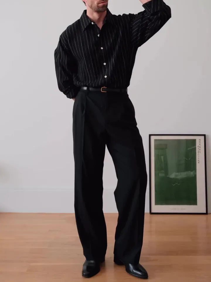 Black pinstriped button-down polyester shirt with regular fit on hanger